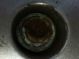 A Peugeot locking nut that had previously been drilled. Removed in minutes.