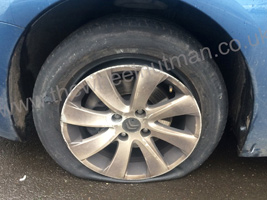 A typical flat tyre and no locking wheel nut key, removed in minutes.